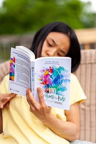 100 Devotions for Kids Dealing with Anxiety by Justine Froelker